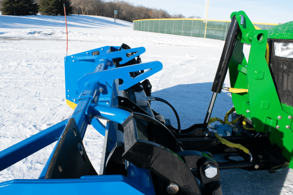 kage blue snow plow snow fire on john deere tractor