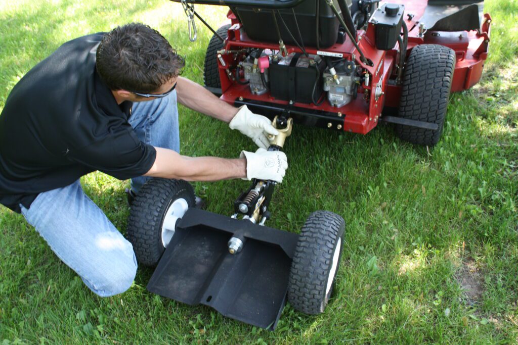 kage innovation wheel kaddy mower sulky with suspension attachment with quick release yoke mount on exmark turf tracer walk behind lawn mower