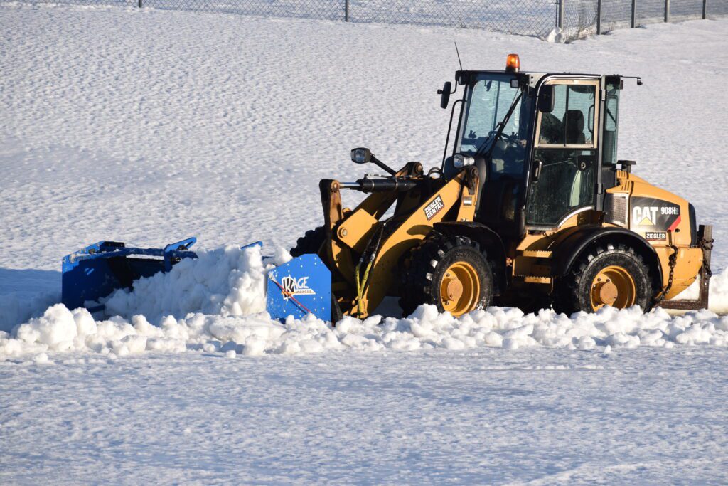 Front End Loader Plowing Snow with KAGE Plow