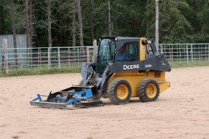 Greater Bar land leveler on John Deere 318E skid steer