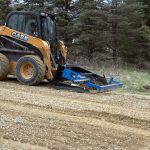 Greater Bar land plane with rippers on case skid loader