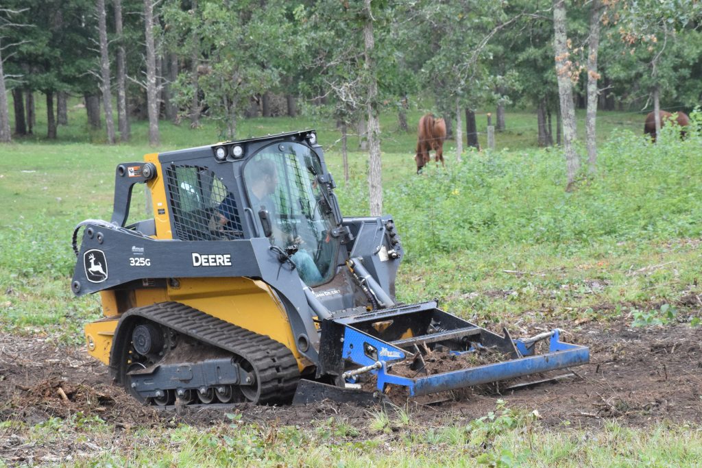 GreatER Bar Land Plane leveling a field