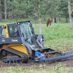 GreatER Bar Land Plane leveling a field