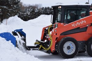 Skid steer snow tires for increased traction