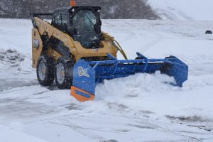 Cold Weather Plowing with skid steer and SnowFire