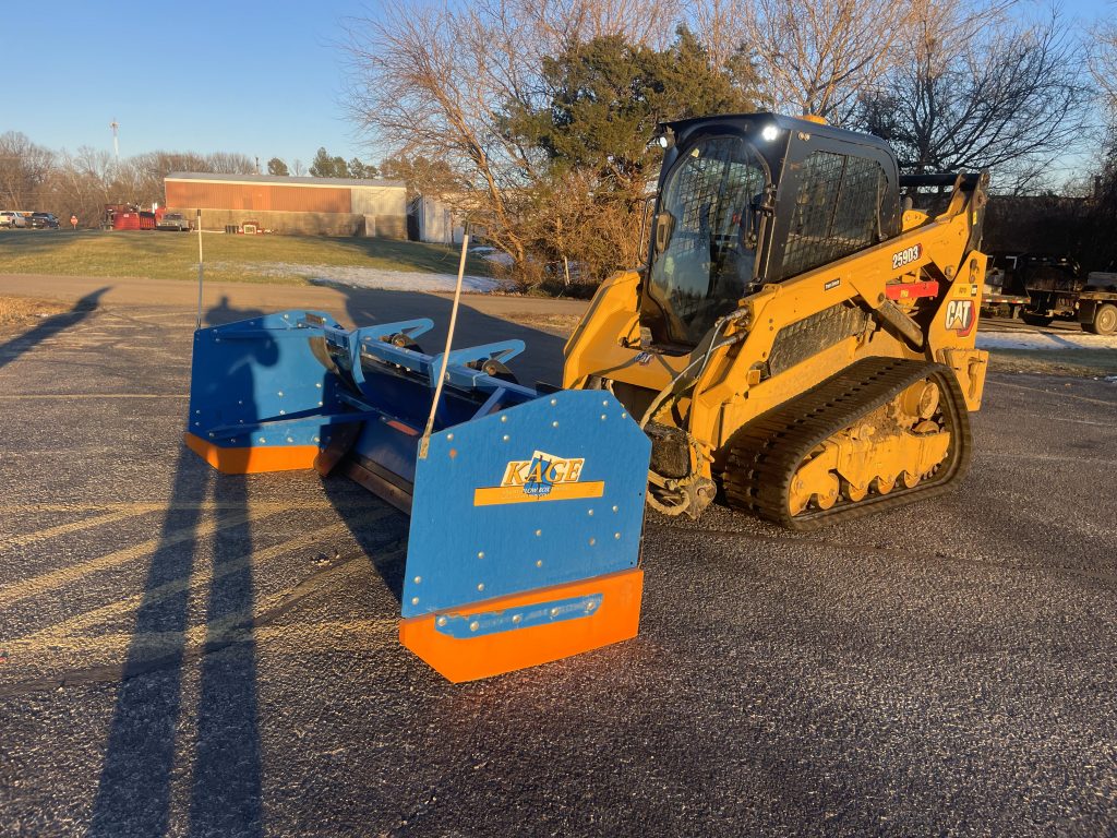 Josh Tichenor's KAGE Snow Fire on CAT compact track loader