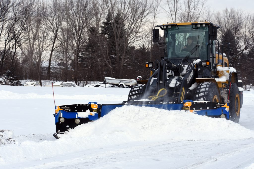 SnowStorm Wing Plowing Snow on Wheel Loader