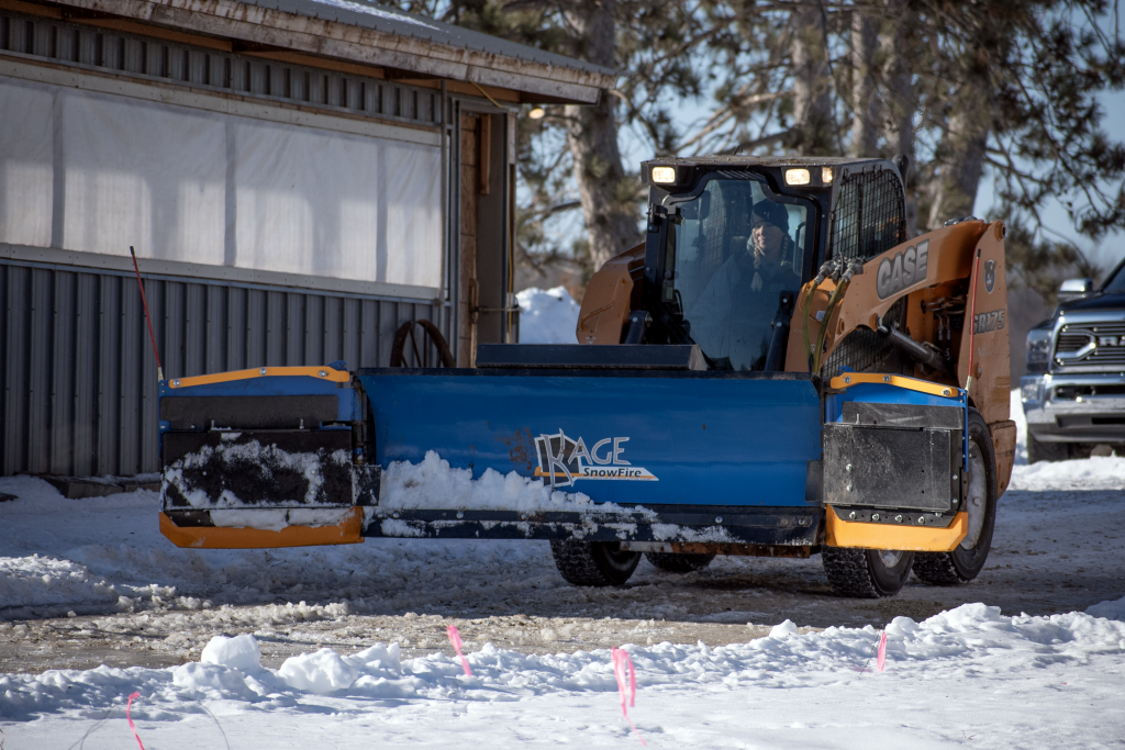 KAGE SnowFire Wing Plow on Case Skid Steer