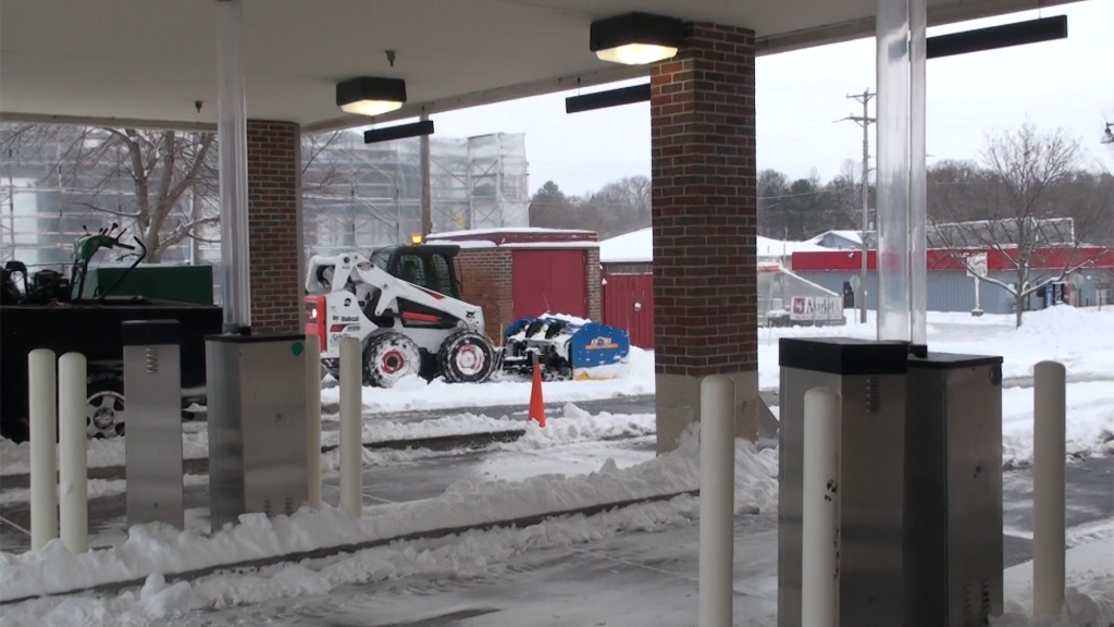 SnowFire Pushing Windrows by Bank Drive-thru